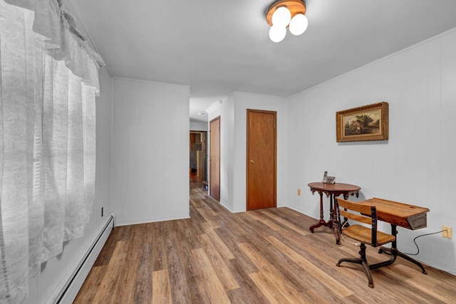 138 Reinhardt Rd, Middletown, NY 10940 - interior space featuring a baseboard heating unit and wood finished floors
