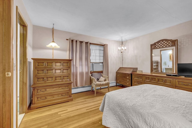 138 Reinhardt Rd, Middletown, NY 10940 - bedroom with cooling unit, light wood-style floors, a chandelier, and a baseboard radiator