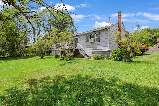 138 Reinhardt Rd, Middletown, NY 10940 - back of property featuring a chimney, stairway, and a yard
