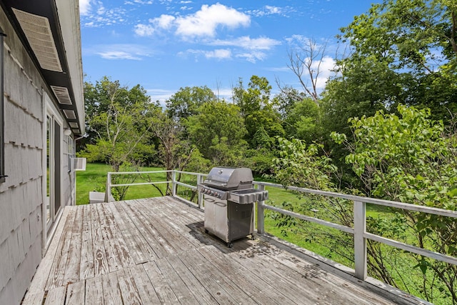 138 Reinhardt Rd, Middletown, NY 10940 - wooden deck with area for grilling, a lawn, and view of wooded area