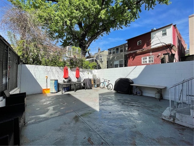 view of patio with a grill