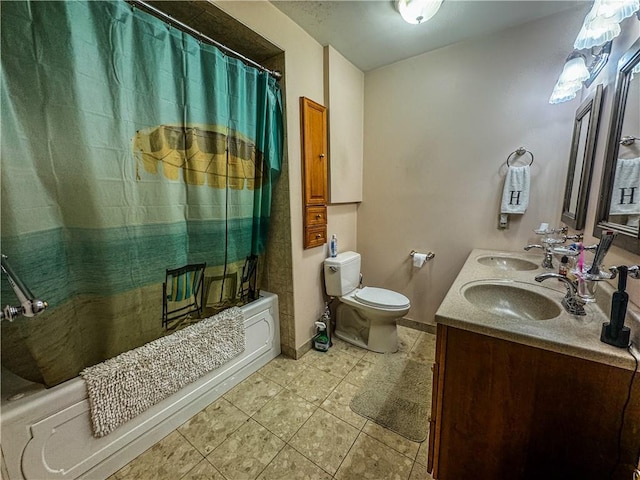 full bathroom featuring tile patterned flooring, shower / bath combination with curtain, toilet, and vanity