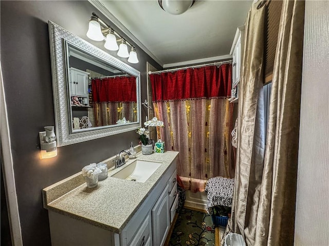 bathroom with shower / bath combination with curtain, ornamental molding, and vanity