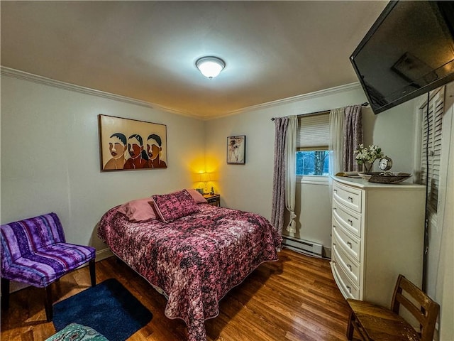 bedroom with ornamental molding, dark wood-type flooring, and a baseboard radiator