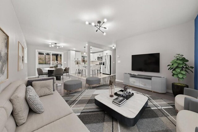 living room with a chandelier