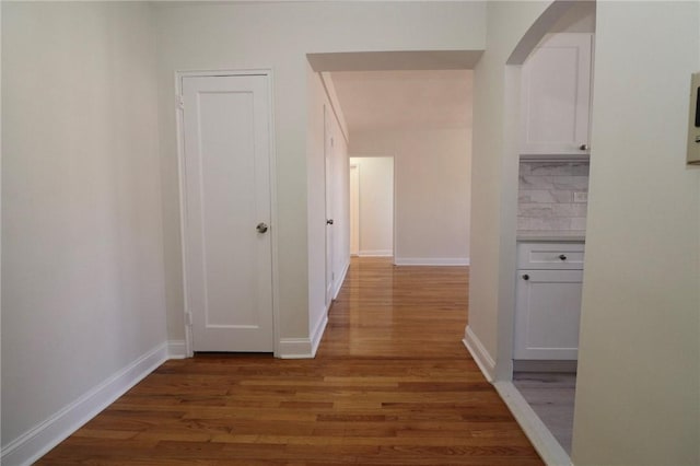 hall featuring wood-type flooring