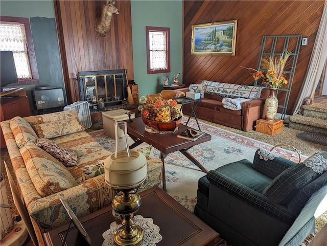 living room featuring wooden walls