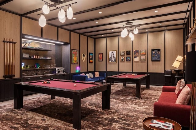 playroom with carpet, wood walls, and pool table