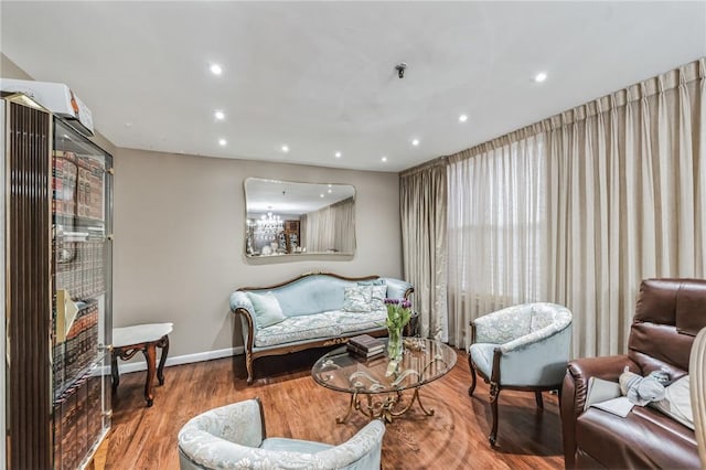 sitting room featuring hardwood / wood-style floors