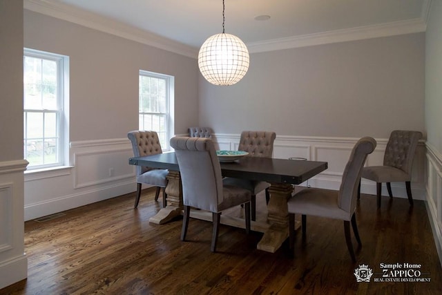 dining room featuring crown molding and dark hardwood / wood-style flooring