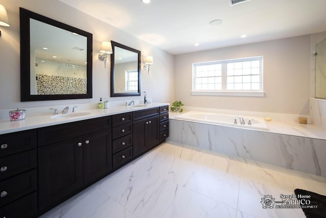 bathroom featuring vanity and plus walk in shower