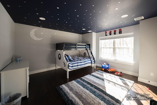 bedroom featuring dark wood-type flooring