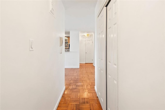 hall with light parquet floors