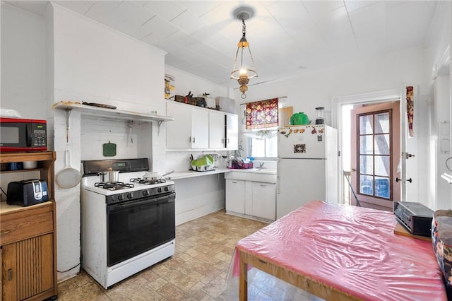 kitchen featuring white cabinets, pendant lighting, white appliances, and french doors