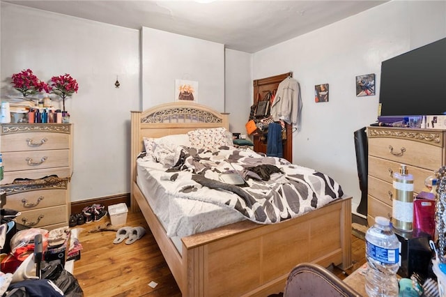 bedroom featuring hardwood / wood-style floors