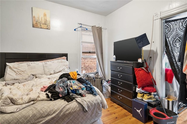 bedroom featuring light hardwood / wood-style flooring