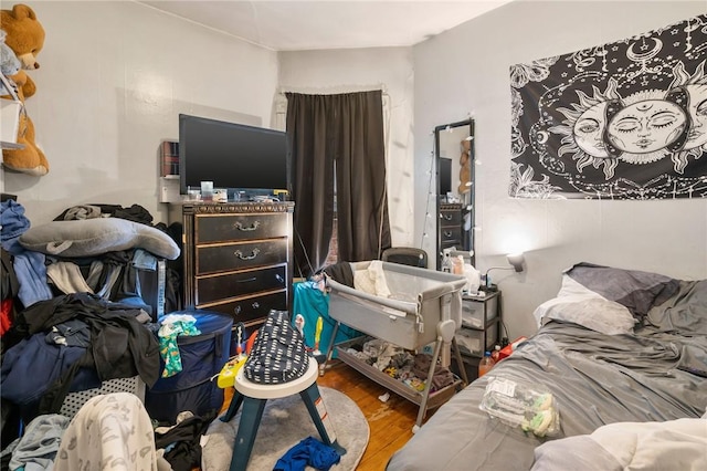 bedroom featuring hardwood / wood-style floors