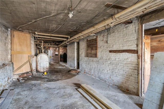 misc room with concrete flooring