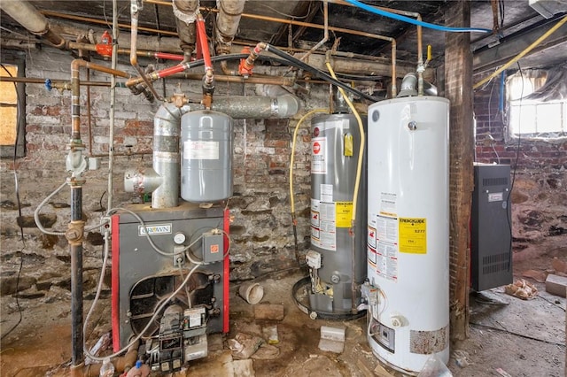 utility room featuring gas water heater