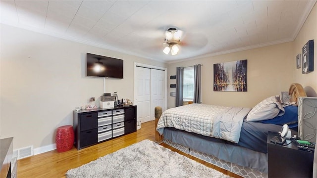 59 Ludingtonville Rd, Holmes, NY 12531 - bedroom with a closet, ornamental molding, wood finished floors, and a ceiling fan