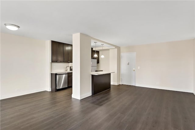 unfurnished living room with dark wood-type flooring