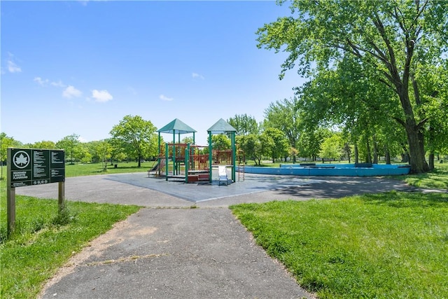 view of play area with a yard