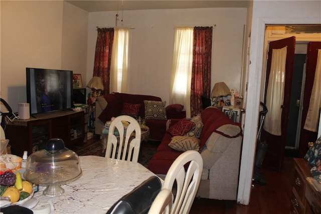 dining room with dark hardwood / wood-style floors