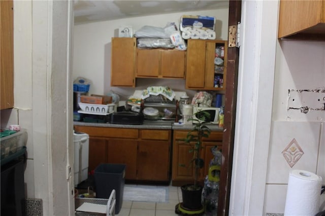 kitchen featuring light tile patterned flooring