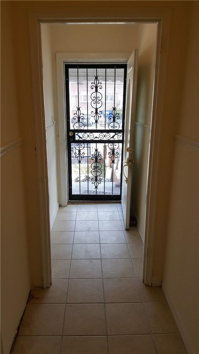 interior space with light tile patterned floors