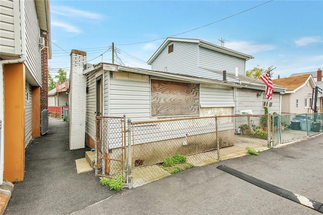 147 Edgewater Park Unit D, Bronx, NY 10465 - view of home's exterior featuring a gate
