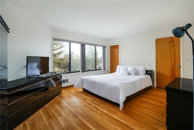 bedroom featuring light hardwood / wood-style flooring