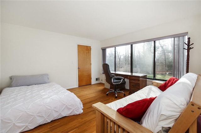 bedroom featuring light hardwood / wood-style floors