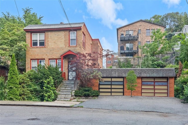 view of front of property with a garage