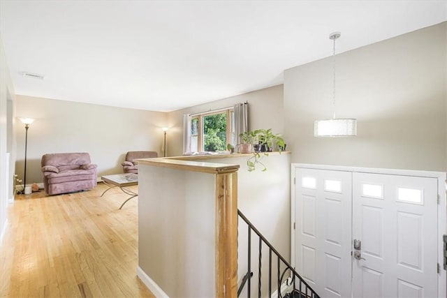 7 Joan Ln, Wappingers Falls, NY 12590 - foyer with light wood finished floors and baseboards