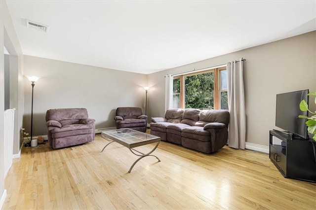 7 Joan Ln, Wappingers Falls, NY 12590 - living area featuring light wood finished floors and baseboards