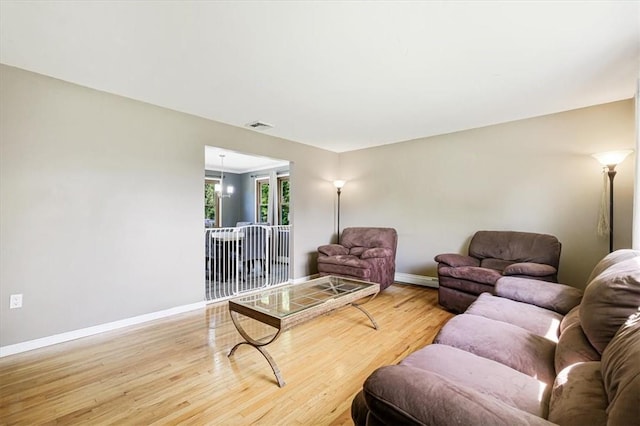 7 Joan Ln, Wappingers Falls, NY 12590 - living room featuring baseboards and wood finished floors