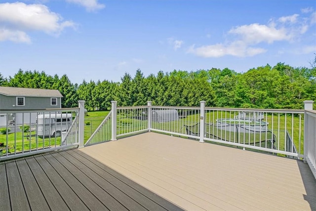 7 Joan Ln, Wappingers Falls, NY 12590 - deck with a yard and view of wooded area
