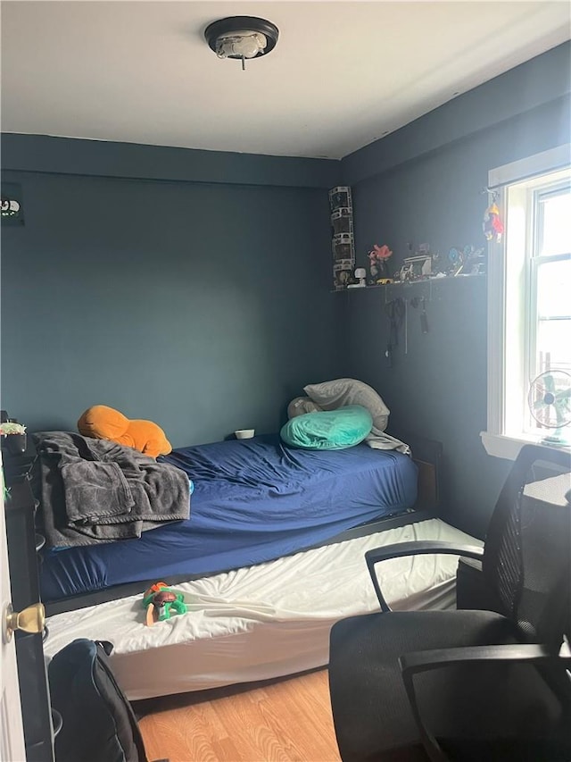 bedroom featuring hardwood / wood-style floors