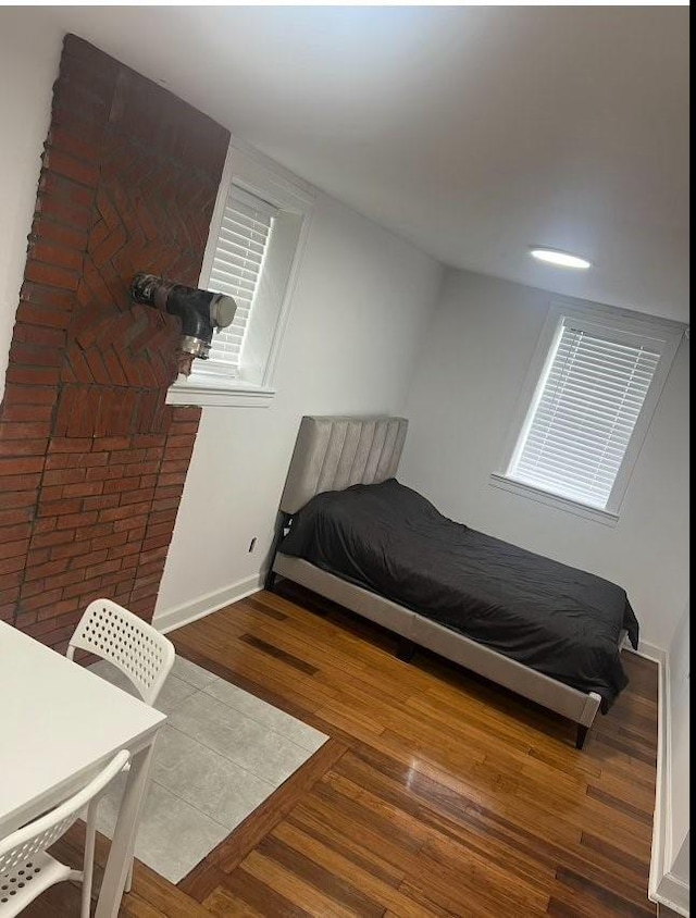 bedroom featuring hardwood / wood-style flooring