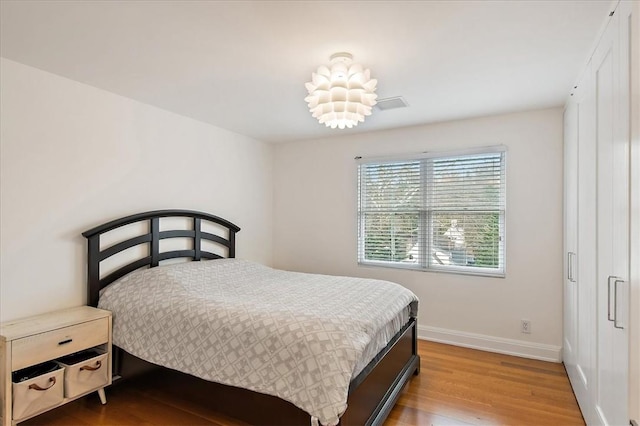 bedroom featuring light hardwood / wood-style flooring