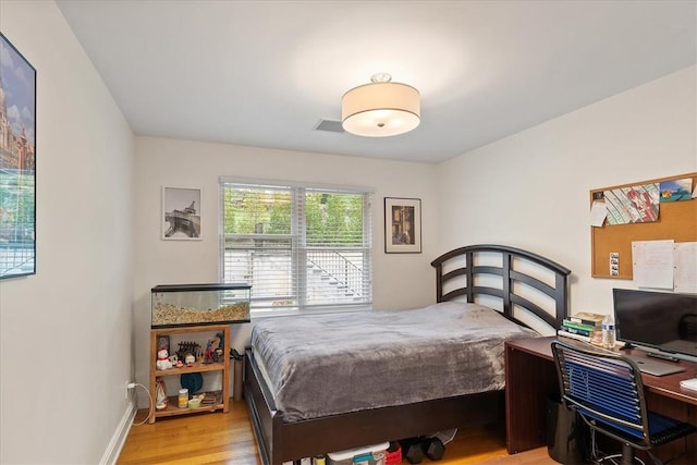 bedroom featuring light hardwood / wood-style flooring