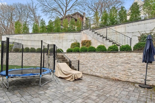 view of patio with a trampoline