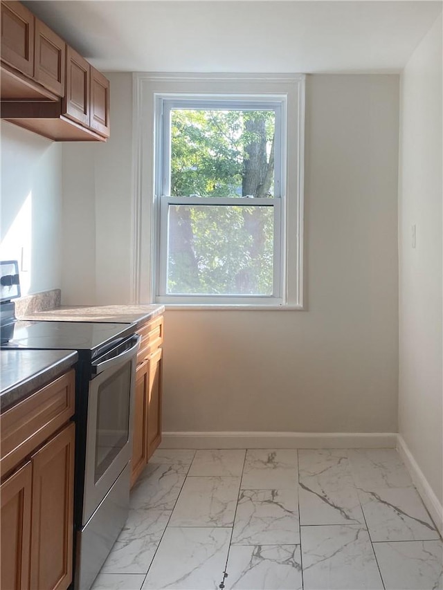 kitchen featuring stainless steel range with electric cooktop