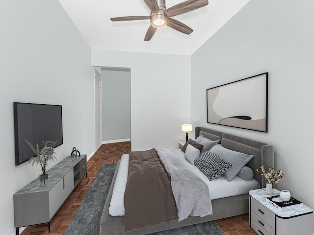 bedroom featuring dark parquet flooring and ceiling fan