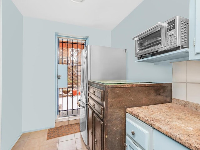 kitchen featuring light tile patterned floors