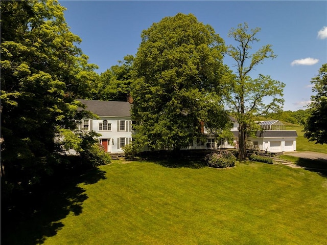 view of yard with a garage