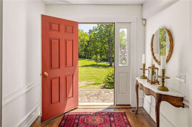 foyer entrance featuring dark hardwood / wood-style flooring