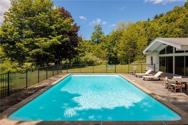 view of pool featuring a patio