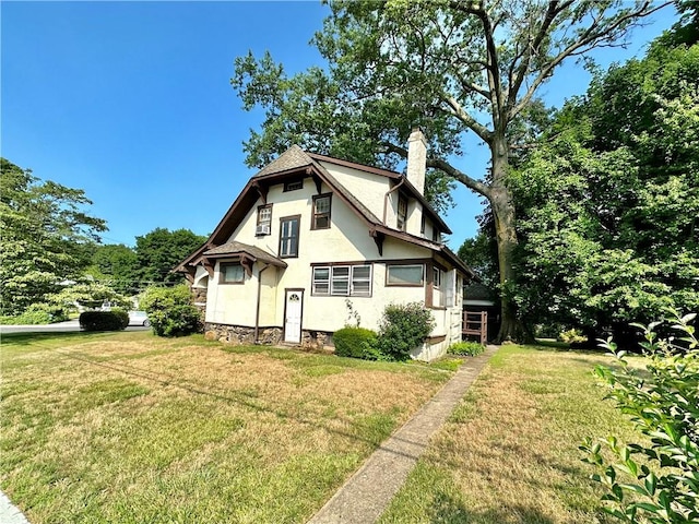 exterior space featuring a front lawn