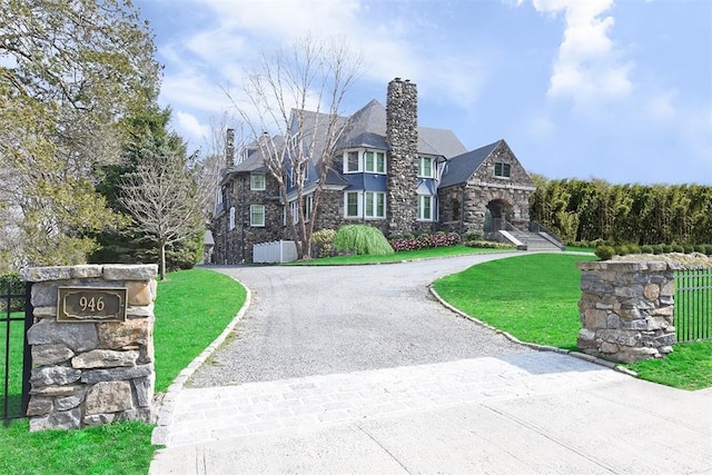 view of front of home with a front lawn